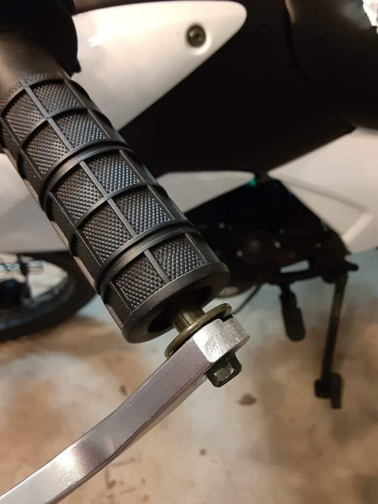Dirt bike handguard bar-end mount spacer bending.