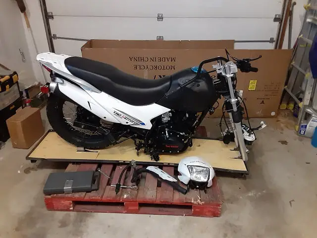 TaoTao TBR7 dual-sport motorcycle out of box with stickers already installed.