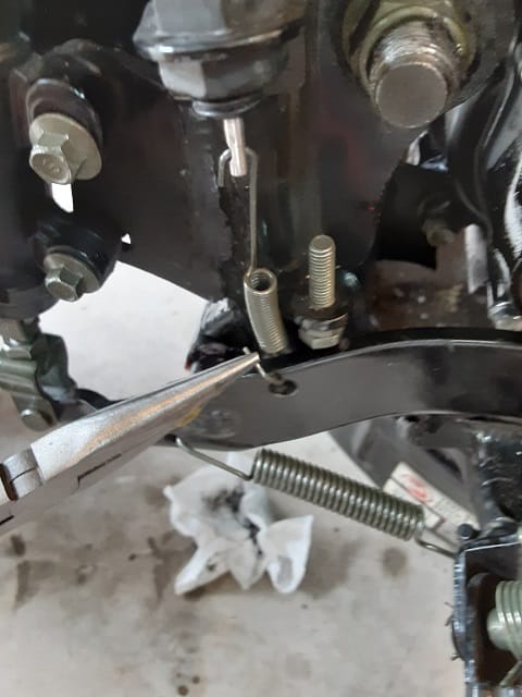 Securing TBR7 Brake light switch spring to rear brake pedal.