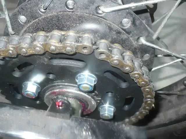 Ends of chain brought over sprocket, to allow master link installation.