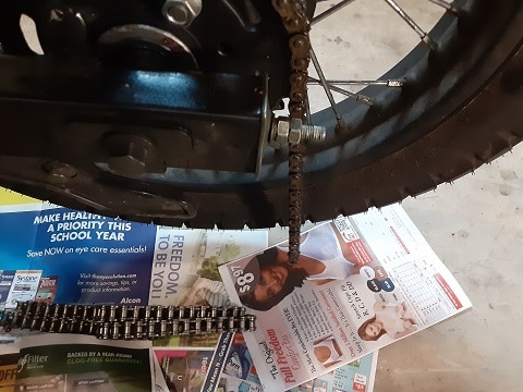 New motorcycle chain connected to old motorcycle chain.