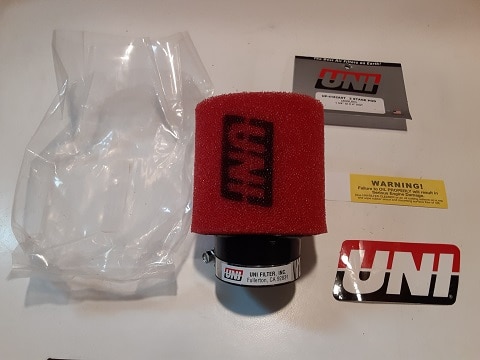 Opening package of Uni Foam air filter.