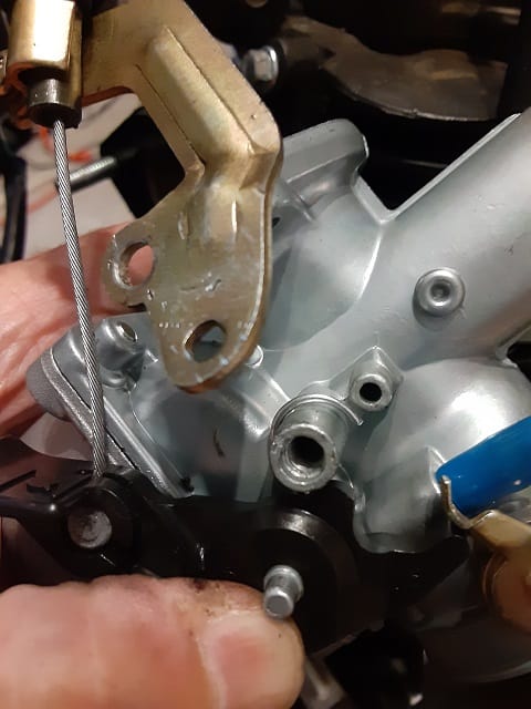 Attaching choke cable to Mikuni carb and holder.