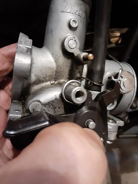 Putting on choke lever on new Mikuni carburetor.
