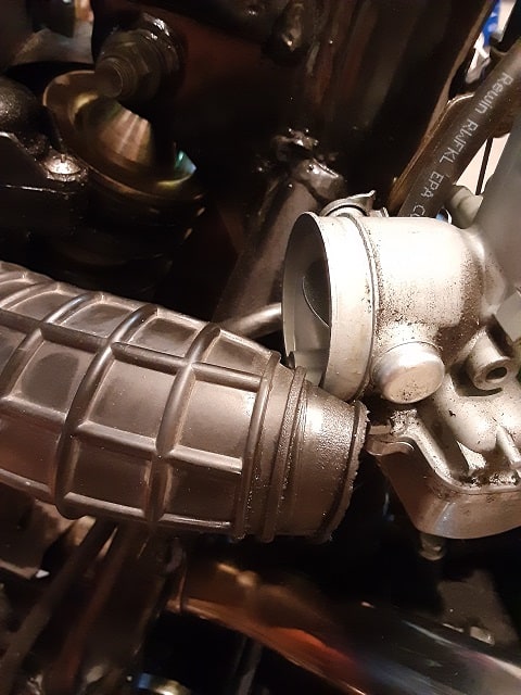 Air intake hose removed from carb.