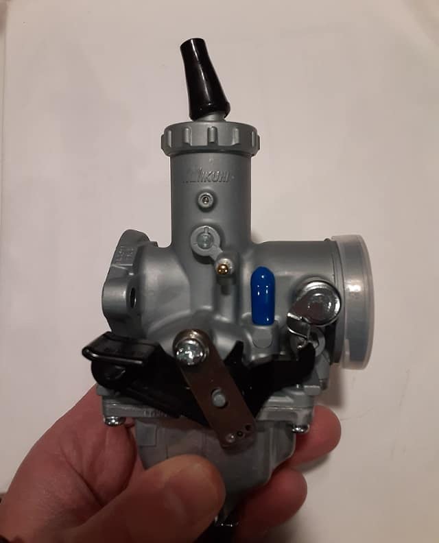New TBR7 carb, can fit in carbureted Hawk 250's.