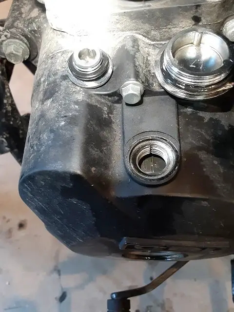 Top dead center of engine mark.  "T"