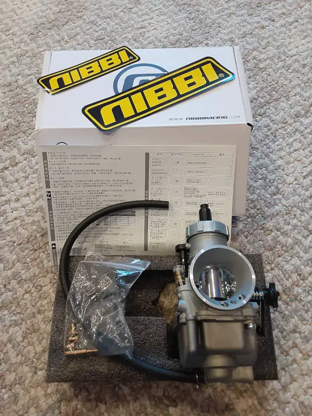 Nibbi Racing Carb PE30 Ouf of box with all the parts, instructions and stickers.