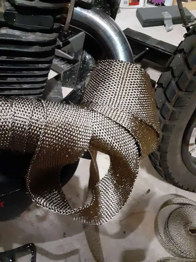 Dry fitting exhaust wrap, guessing at needed length and cutting.