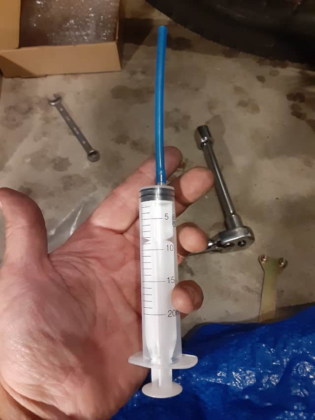 Syringe that came with the new motorcycle oil cooler.   