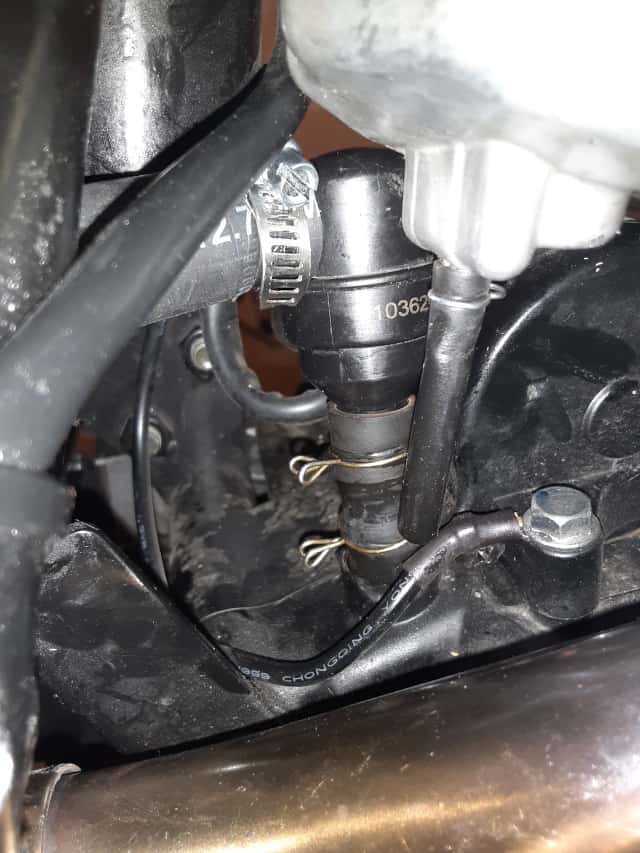 New crank case vent hose on original TBR7 oil separator.   