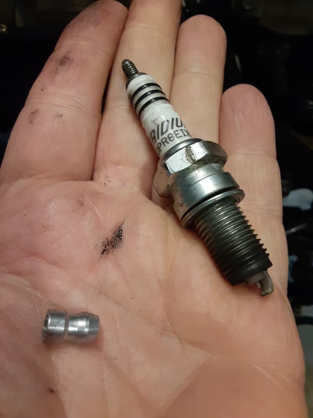 New spark plug made ready for the TaoTao TBR7 motorcycle.