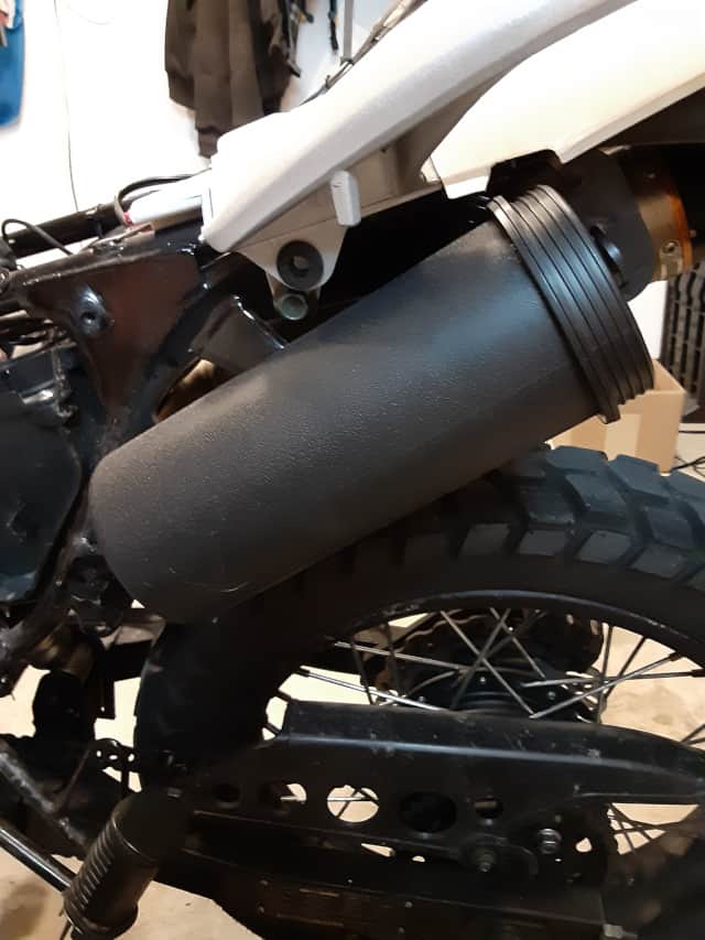 Burrito storage tube installed on TBR7 motorcycle, cap off.