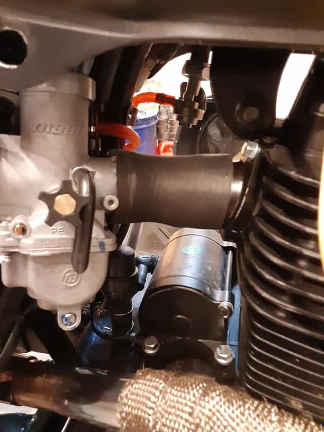 Radiator hose fitted on Nibbi carb and Nibbi engine manifold.  