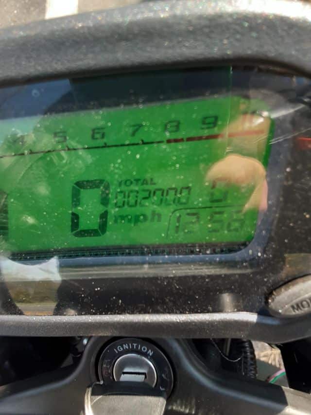 My Grom Clone, a Boom Vader, odometer at 200 miles.