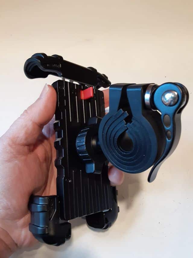 Motorcycle phone holder with handbar clamp attached.