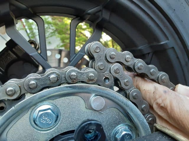 New motorcycle chain overlapping too long.