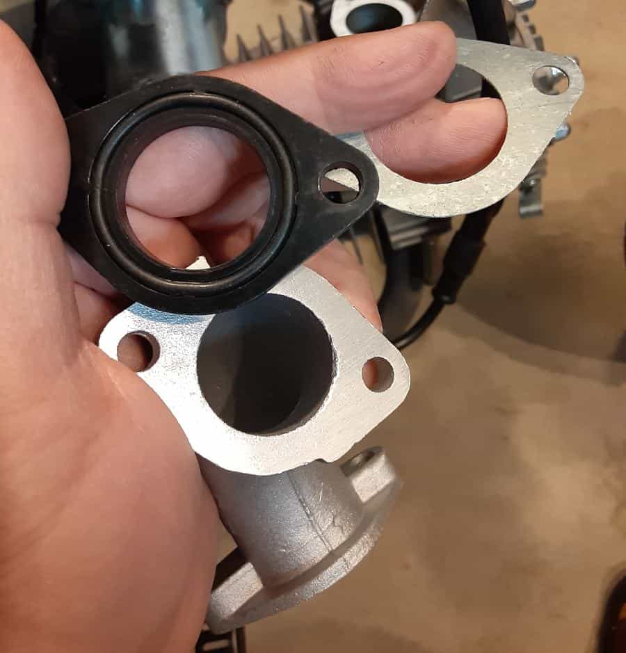 Extra spacer and gasket in the Grom Clone carb upgrade kit.