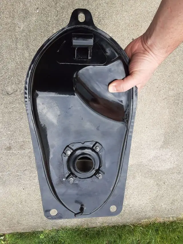 Flipped image of my motorcycle gas tank before the mechanic leak repair.