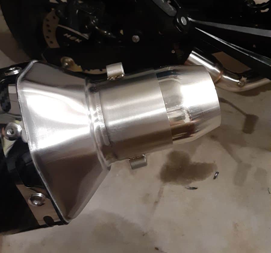 New muffler inlet with spring clip mounts and inlet adaptor.
