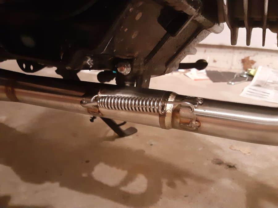 New Boom Vader motorcycle exhaust spring mounted in groove.