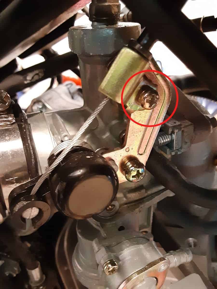 Remote choke cable on carburetor.