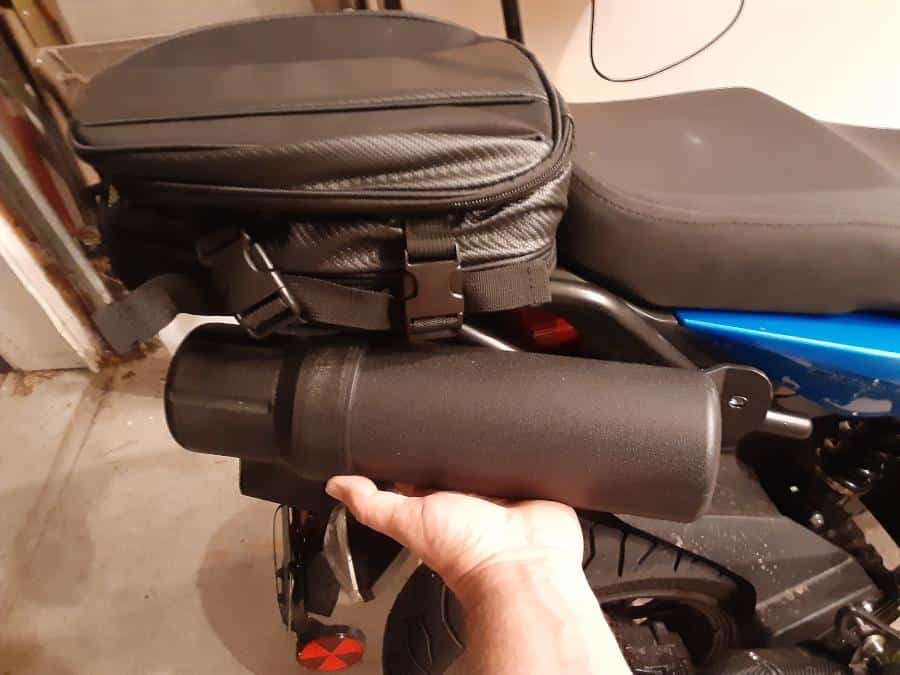Positioning burrito tube on bike for fuel bottle storage.  