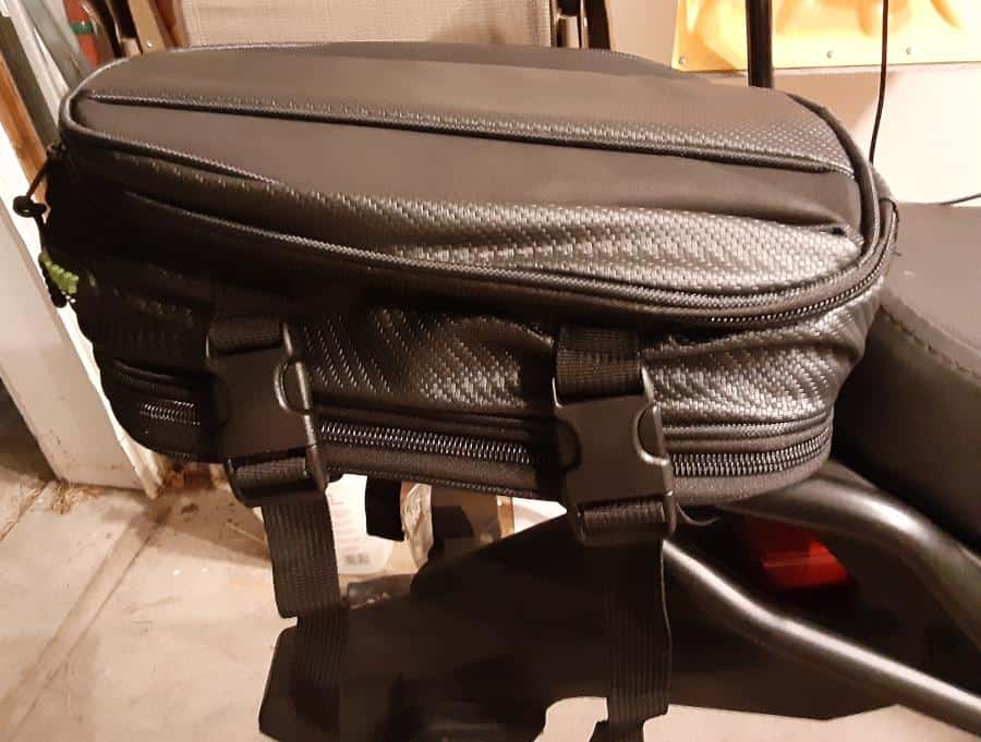 Motorcycle tail bag installed, side view.