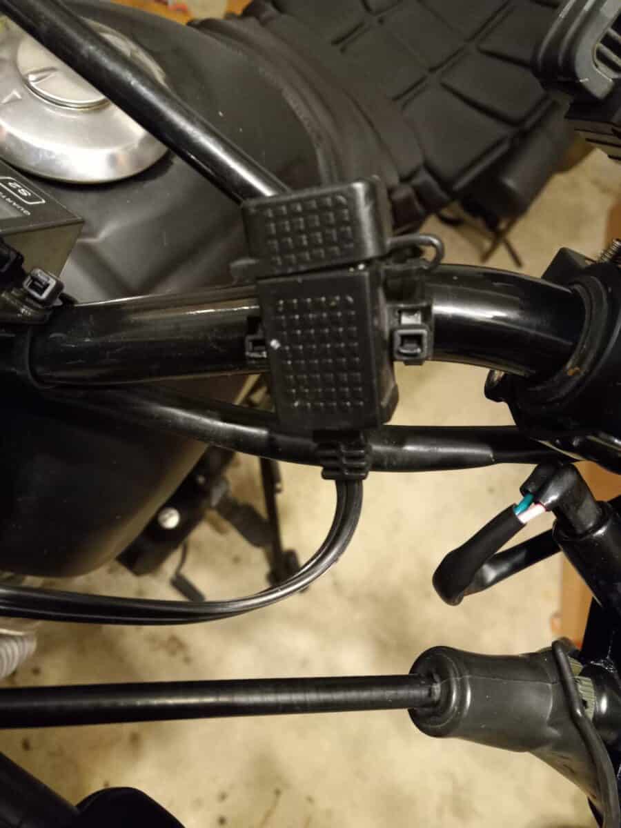 Motorcycle USB phone charger installed.