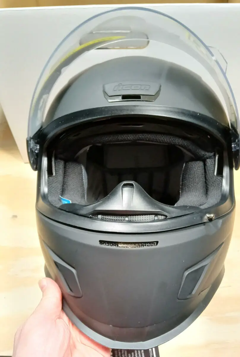 Icon AirForm Helmet with sunglasses up.